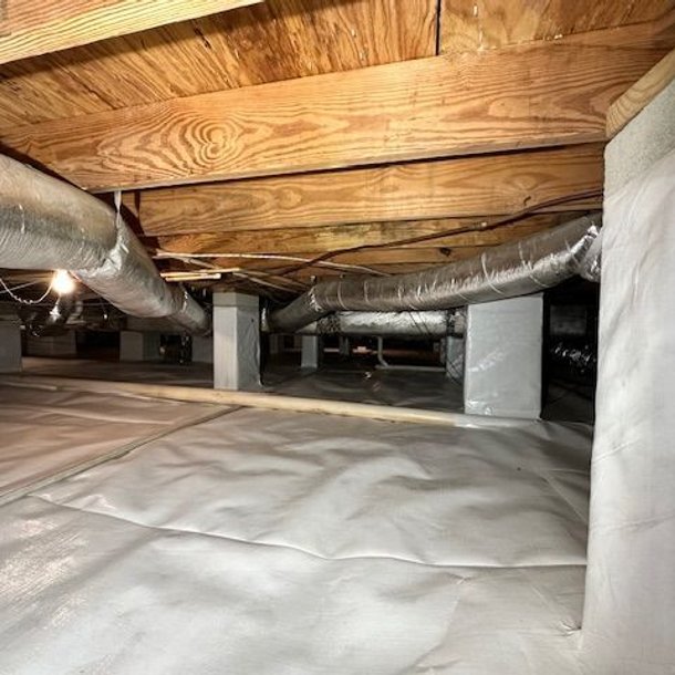 Finished encapsulated crawl space with sealed vapor barrier