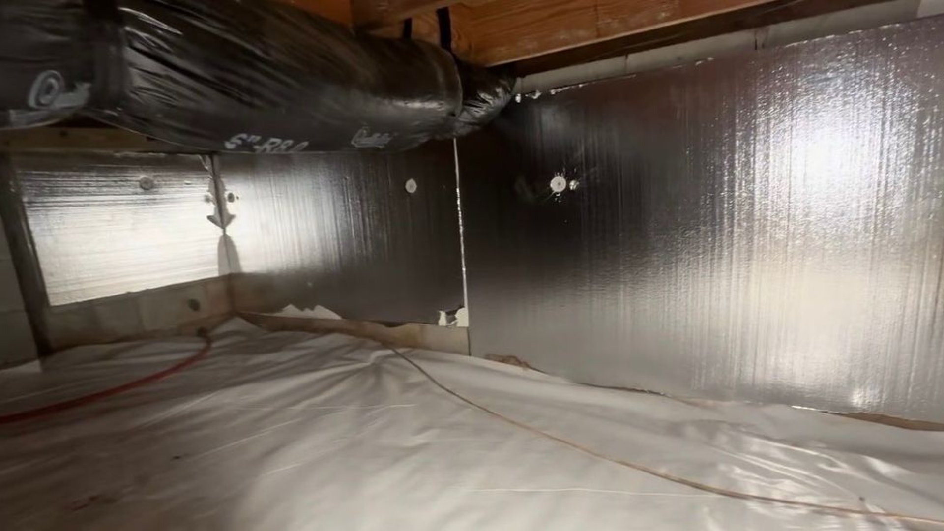 Rigid foam board insulation installed in a crawl space